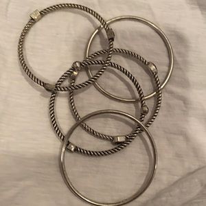 Silver bangle bracelet with some stones